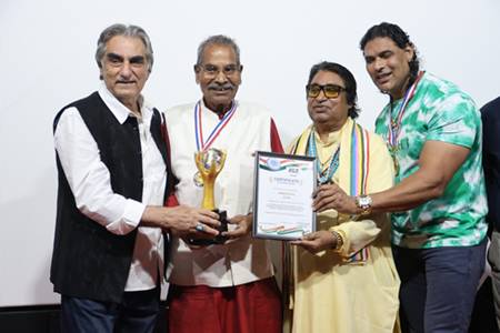 Sunil Pal, Dilip Sen, Ali Khan, Ketan Karade, Ramesh Goyal, Writer Deepak Desai, And Restaurant Owner Mohammad Bhai Honored At The KCF ‘Bollywood Legends Film Festival 2026’ Organized By Dr. Krishna Chouhan